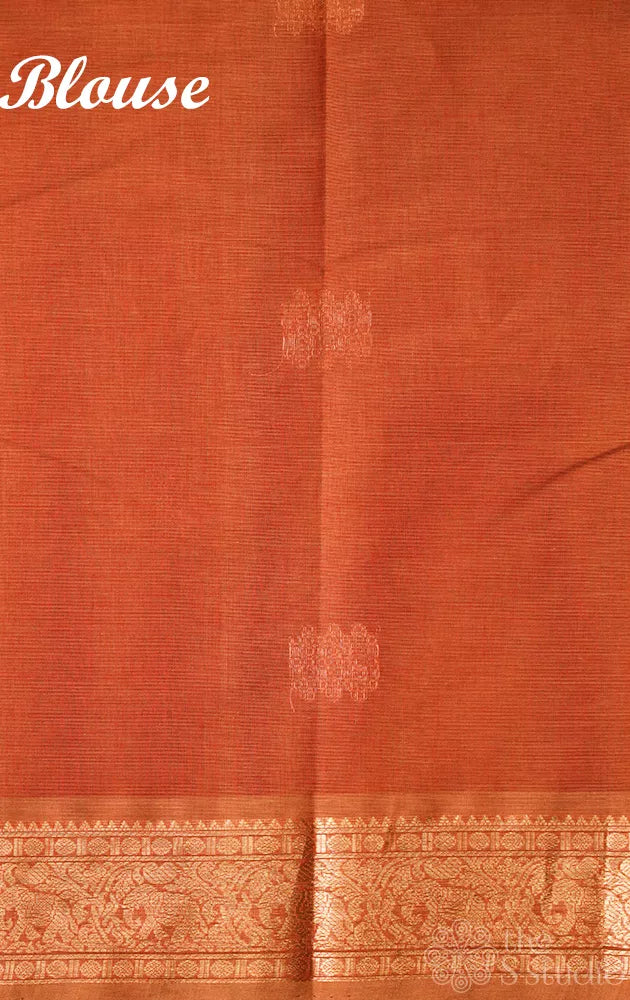 Rust handloom kanchi cotton saree with zari woven border