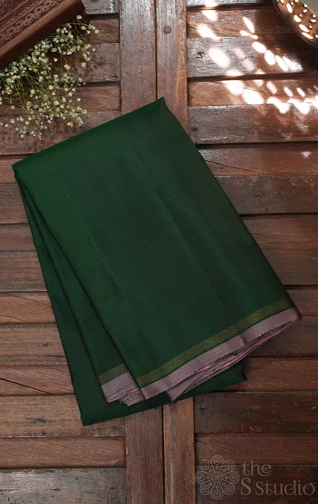 Green plain kanchi silk saree with onion pink pallu