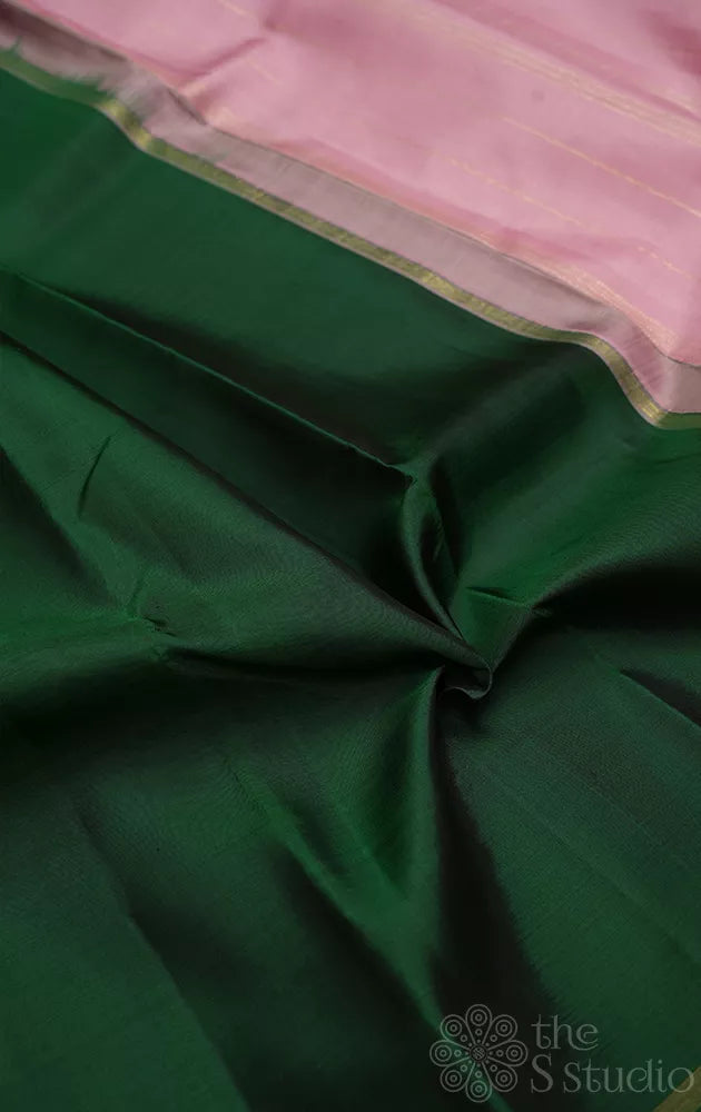 Green plain kanchi silk saree with onion pink pallu