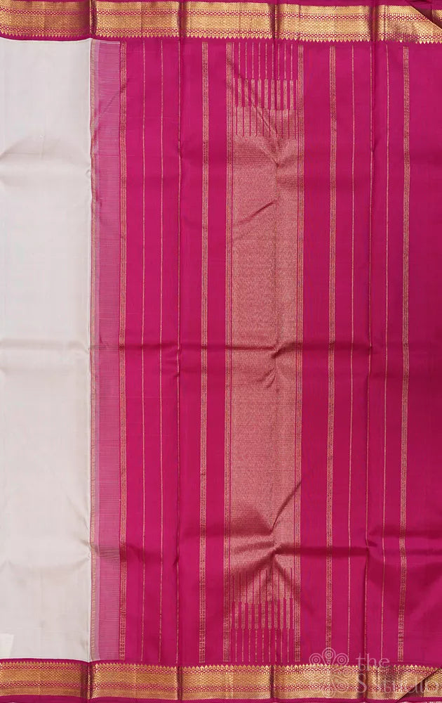 Off white kanchipuram silk saree with korvai maroon border