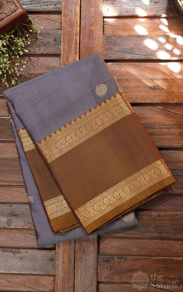 Steel grey colour kanchipuram silk saree with rettaipet mustard border