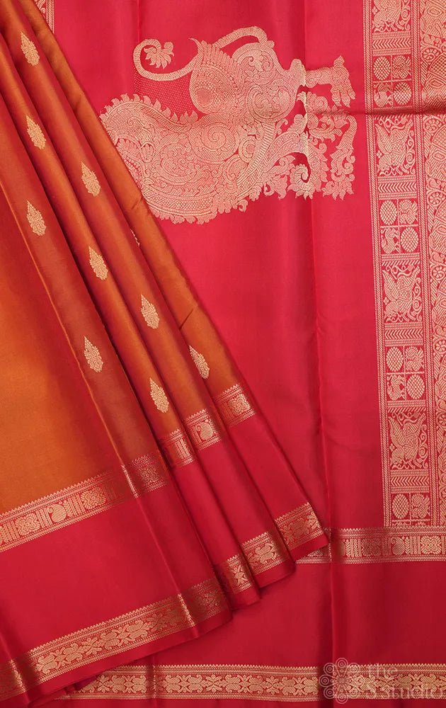 Rust kanchi silk saree with rettaipet red coloured border