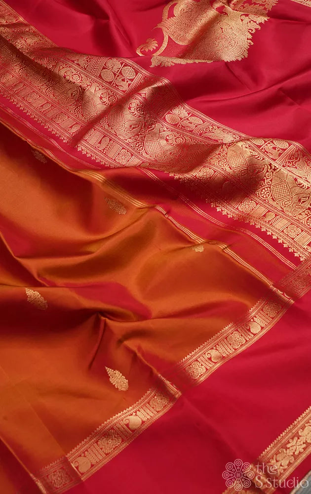 Rust kanchi silk saree with rettaipet red coloured border
