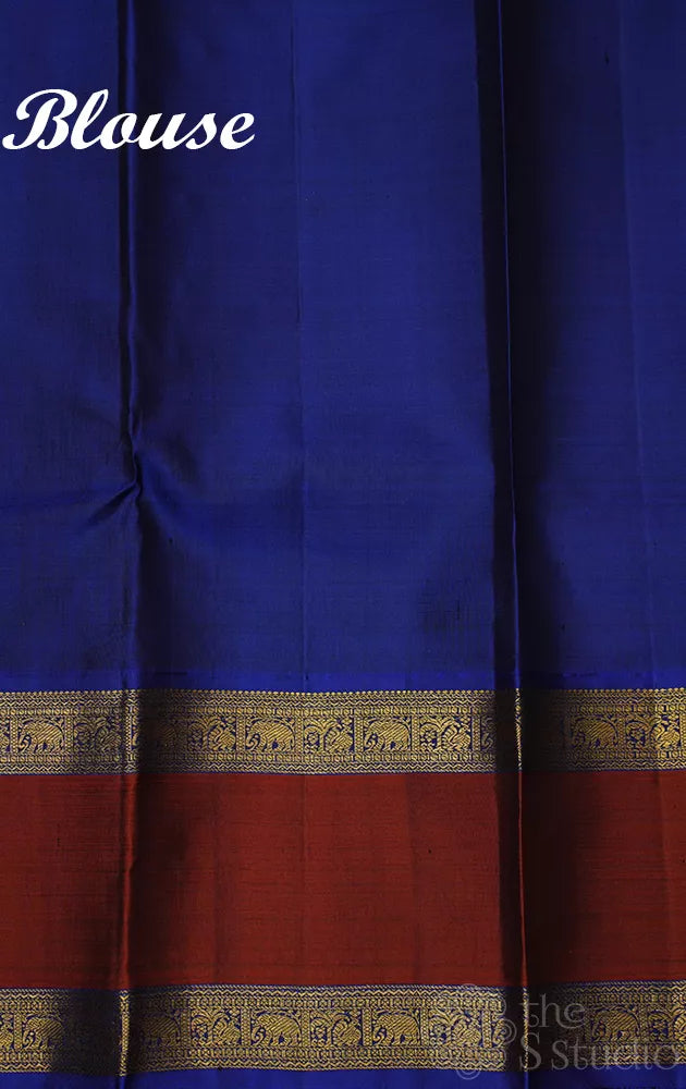 Orangish peach kanjivaram silk saree with korvai rettaipet border