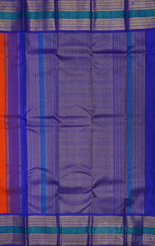 Fanta orange kanchipuram silk saree with korvai blue border