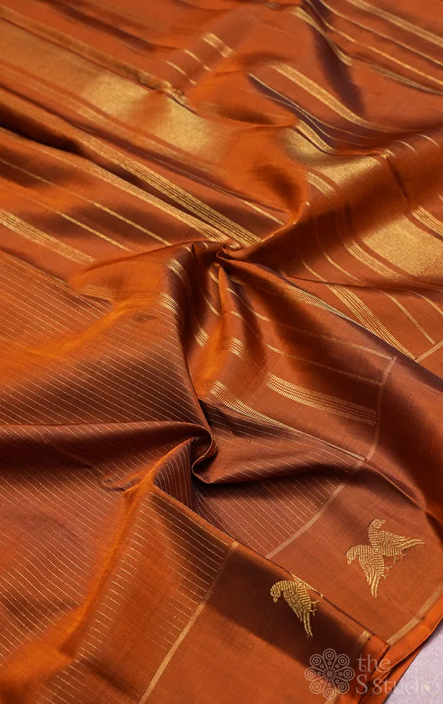 Honey rust kanjivaram silk saree with vertical zari lines