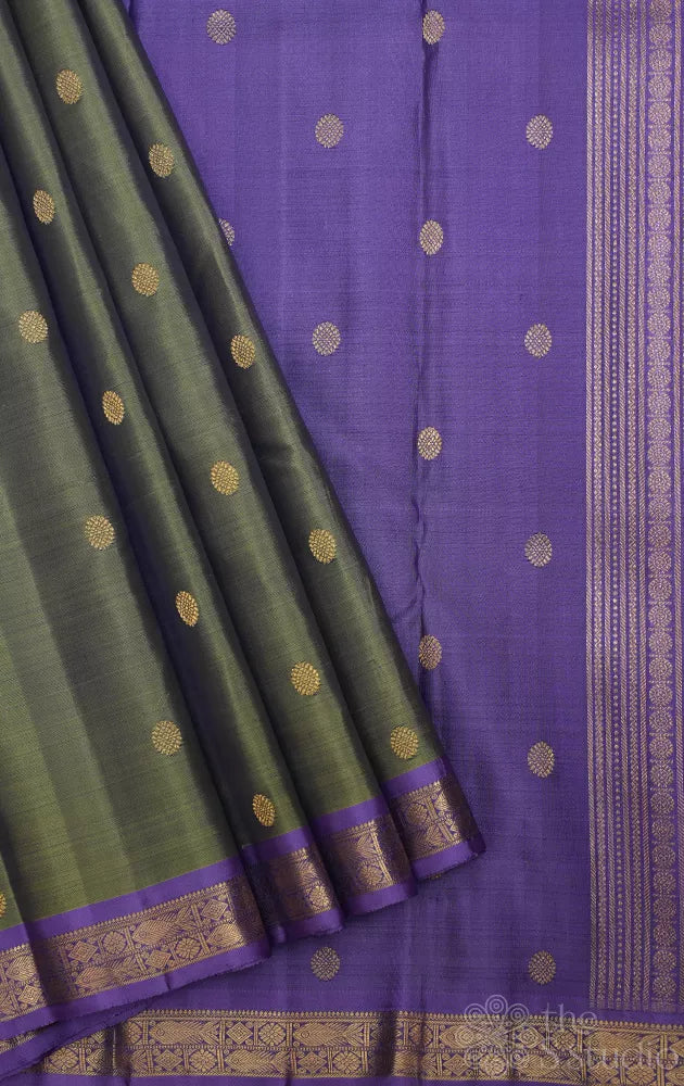 Olive green kanchi pattu saree with lavendar border and pallu