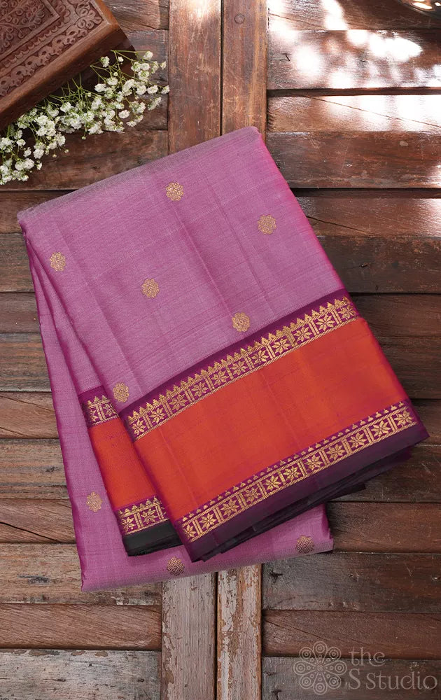 Pinkish lavendar kanchipuram silk saree with purple rettai pet border