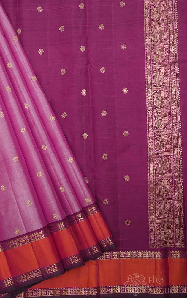 Pinkish lavendar kanchipuram silk saree with purple rettai pet border