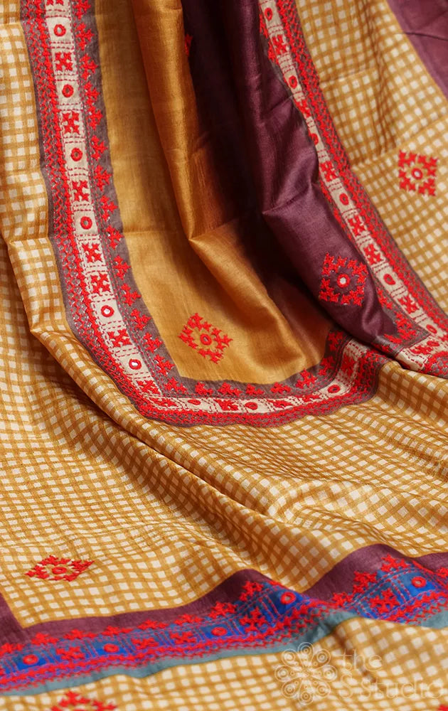 Mustard and Brown tussar silk saree with block prints & hand kutch embroidery