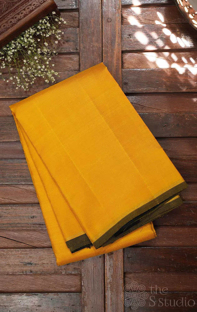Plain Mustard yellow kanchi silk saree with black pallu