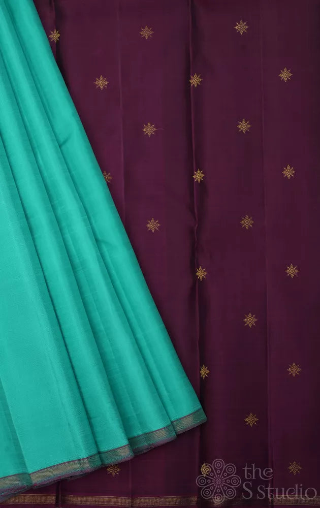 Sea green colour plain kanchi silk saree with contrast pallu