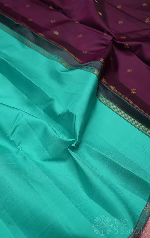 Sea green colour plain kanchi silk saree with contrast pallu