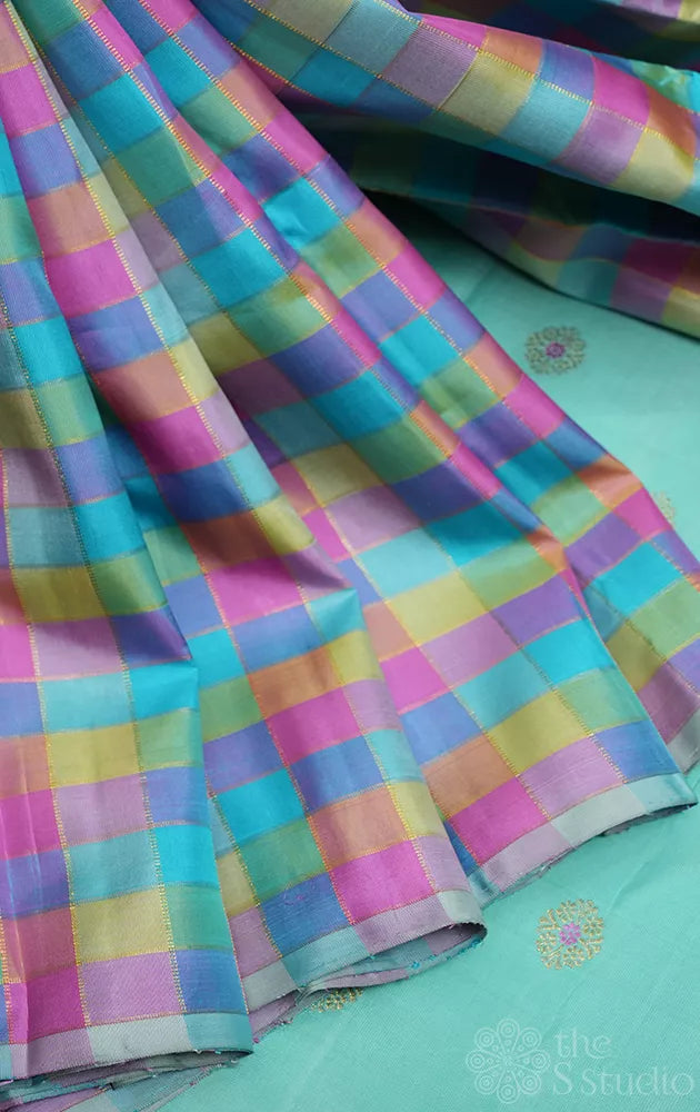 Pastel checked kanchipuram silk saree with pale blue pallu