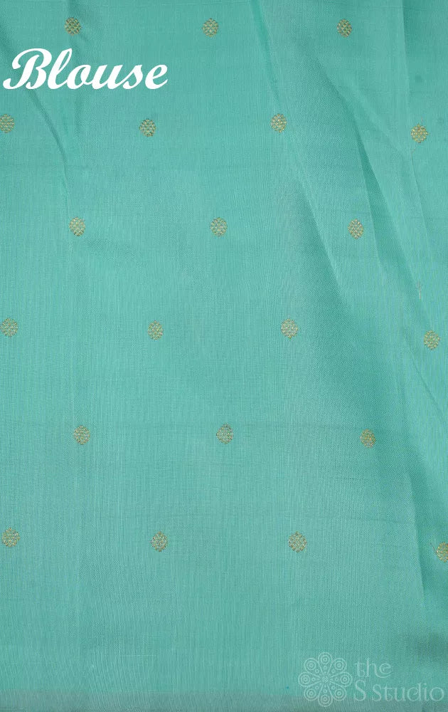 Pastel checked kanchipuram silk saree with pale blue pallu