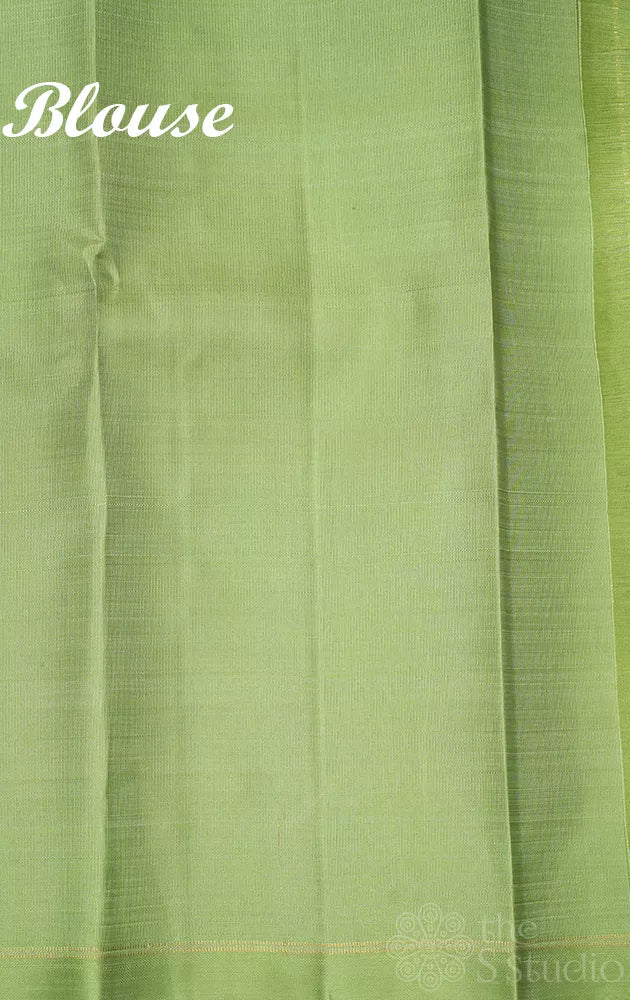 Violet borderless Kanchipuram silk saree with contrast elaichi green pallu