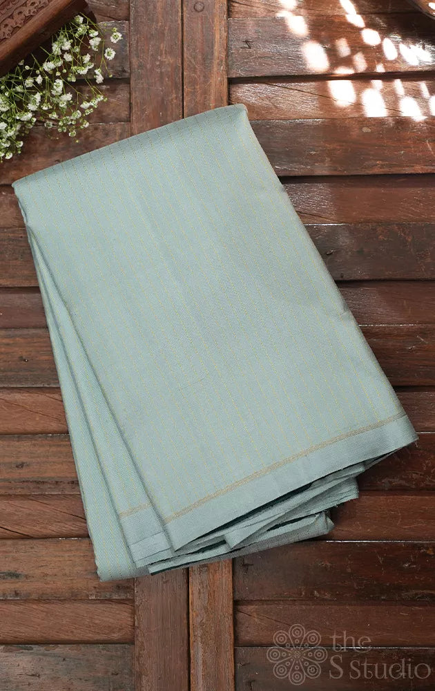 Powder blue borderless Kanchipuram silk saree with thread lines