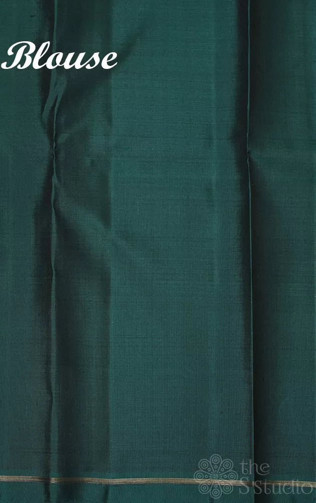 Powder blue borderless Kanchipuram silk saree with thread lines