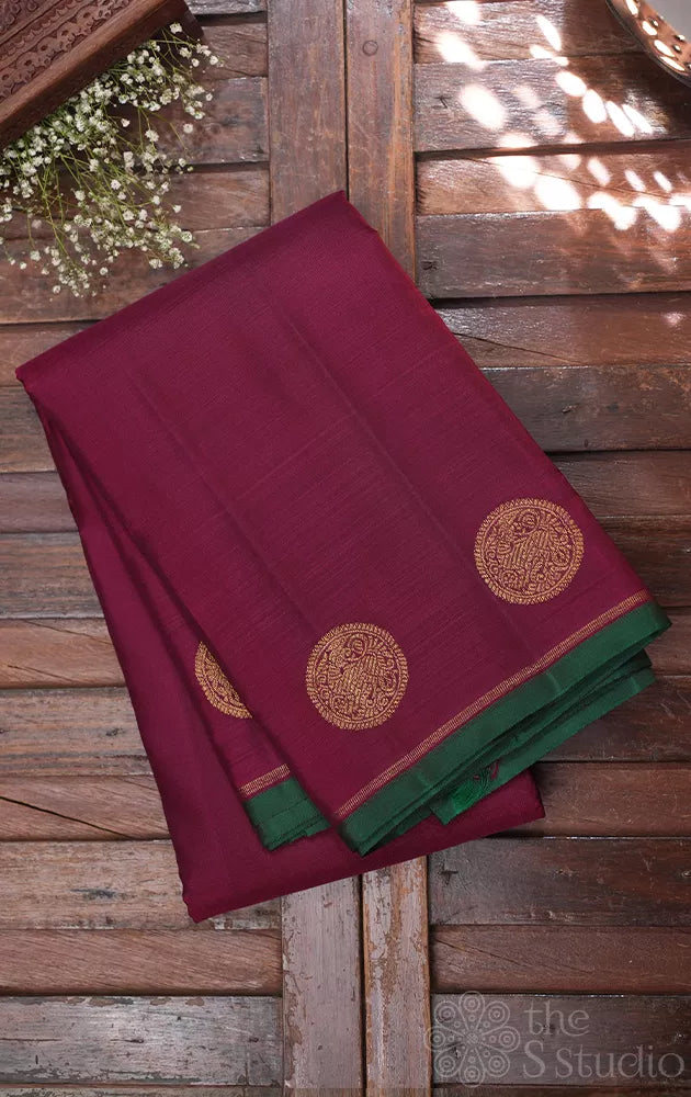 Maroon kanjivaram saree with border buttas