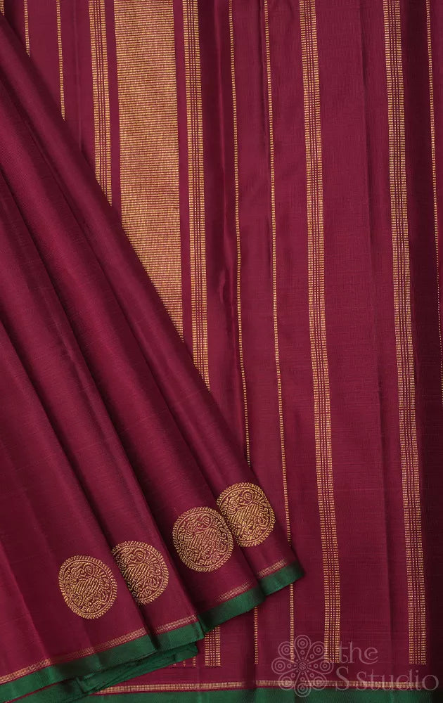 Maroon kanjivaram saree with border buttas