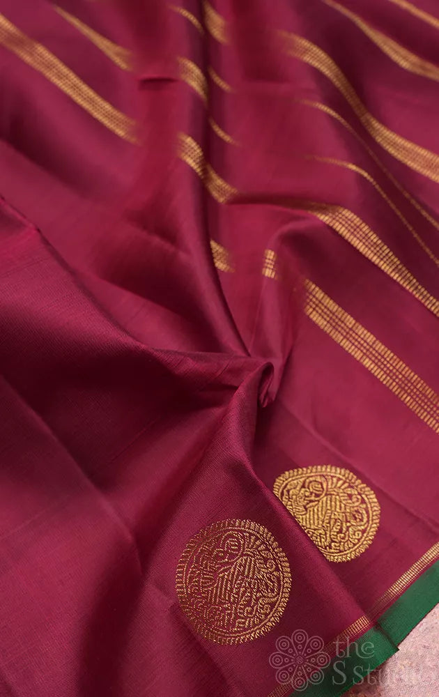 Maroon kanjivaram saree with border buttas