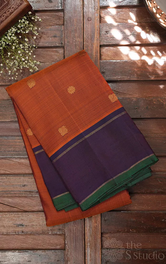 Rust kanchipuram silk saree with violet border
