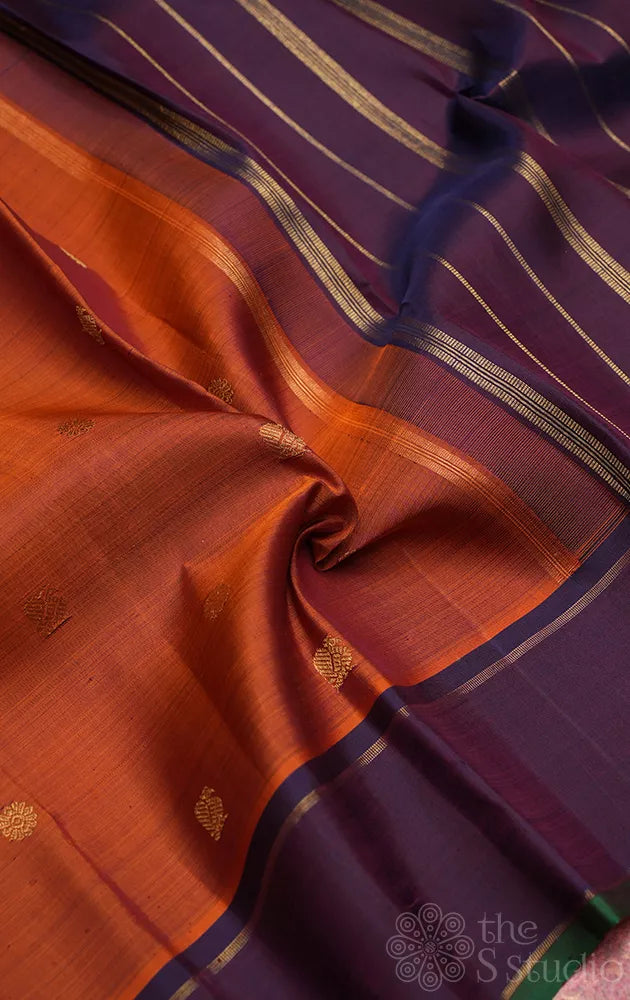 Rust kanchipuram silk saree with violet border