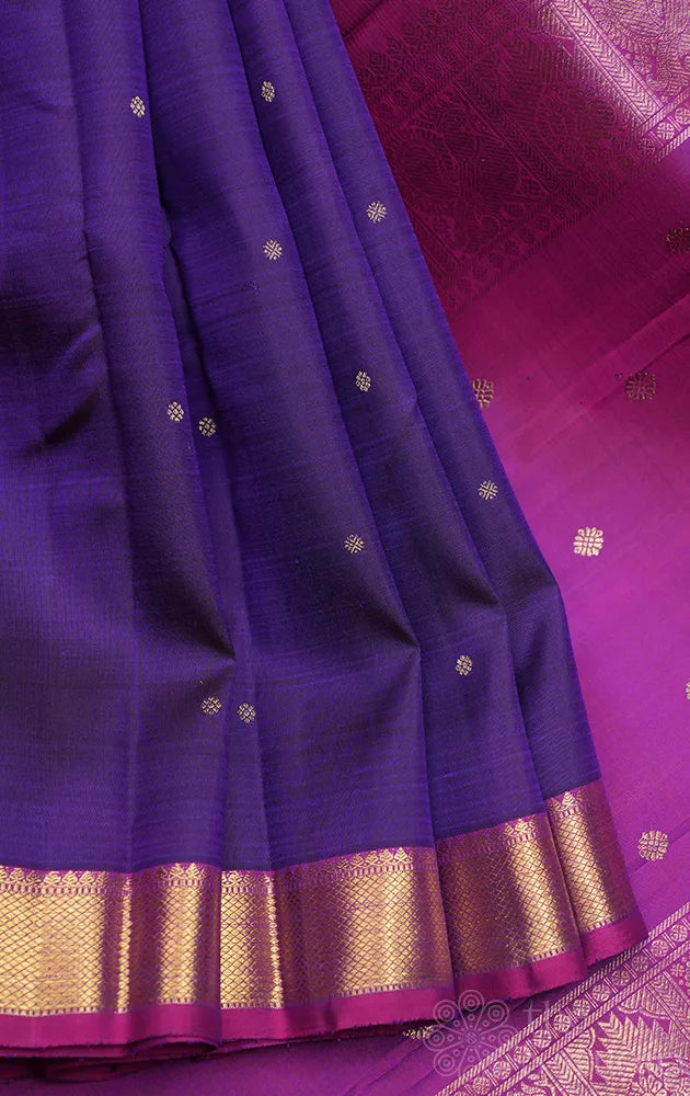 Violet kanchipuram silk saree with small purple getti zari border