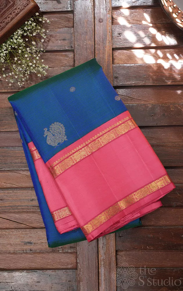 Peacock blue kanjivaram silk saree with korvai bubble gum pink border