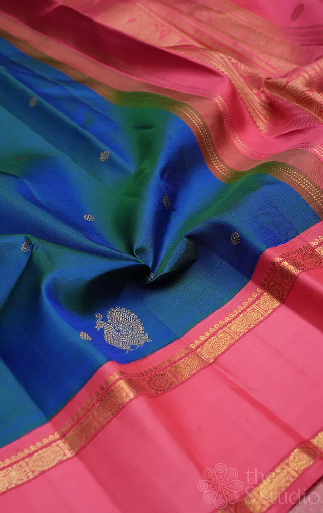 Peacock blue kanjivaram silk saree with korvai bubble gum pink border