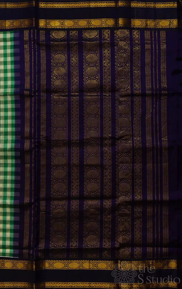 Green and white handloom checked silk cotton saree with korvai rettaipet border