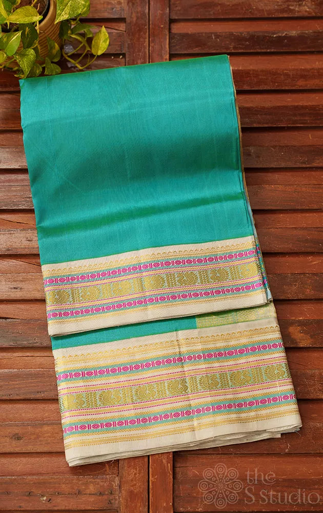 Turquoise blue handloom silk cotton saree with grey korvai border