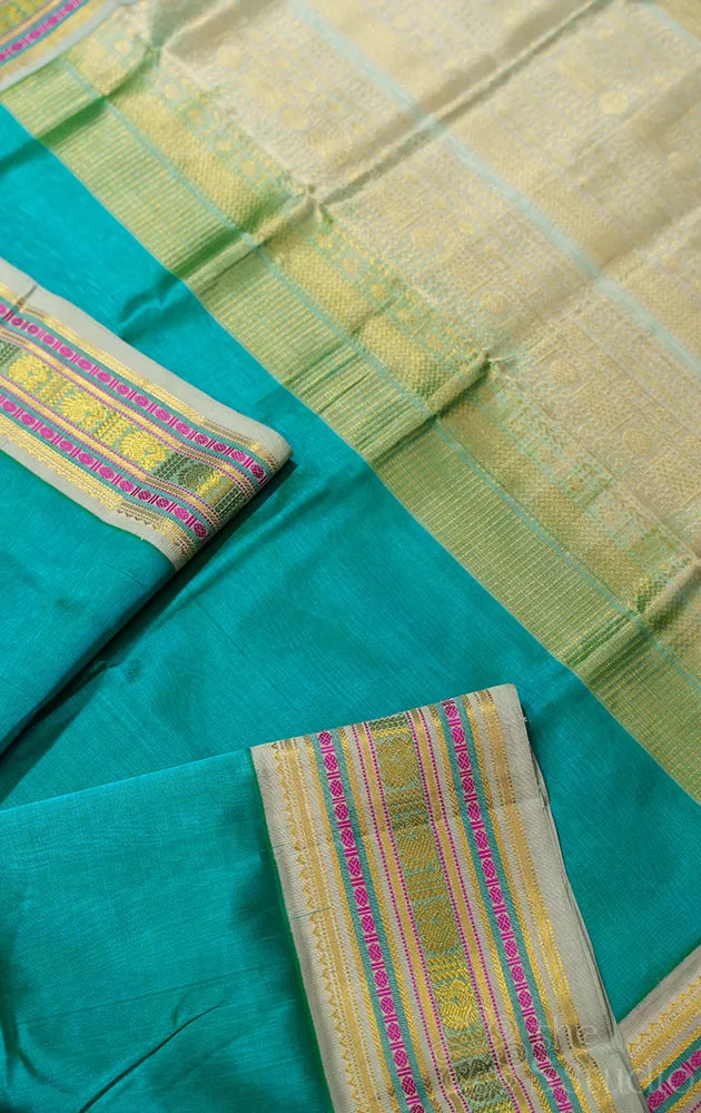 Turquoise blue handloom silk cotton saree with grey korvai border