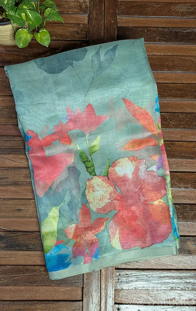 Sage green linen saree with floral prints