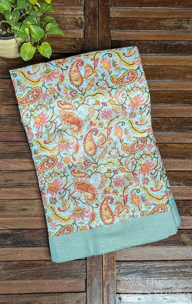 Sea green linen saree with paisley prints