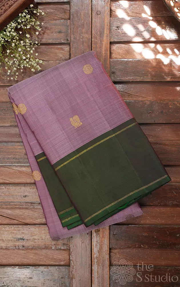 Mauve colour kanchipuram silk saree with green bodi karai border