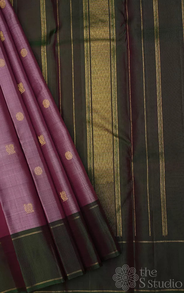 Mauve colour kanchipuram silk saree with green bodi karai border