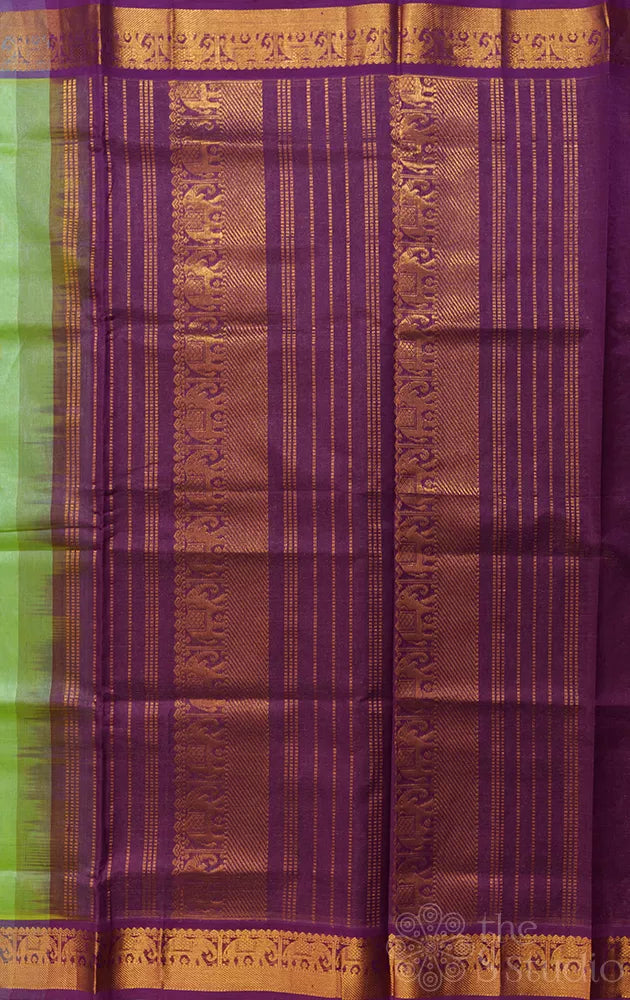 Light pista green vairaoosi silk cotton saree with purple zari border