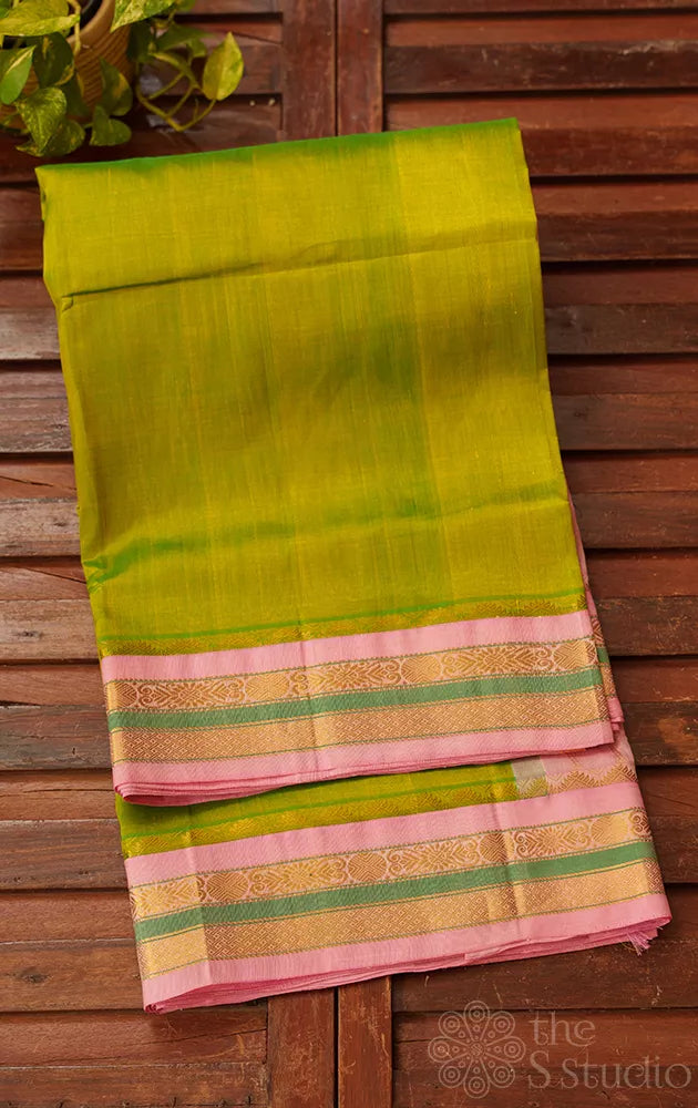 Light green kanchipuram silk cotton saree with pink border