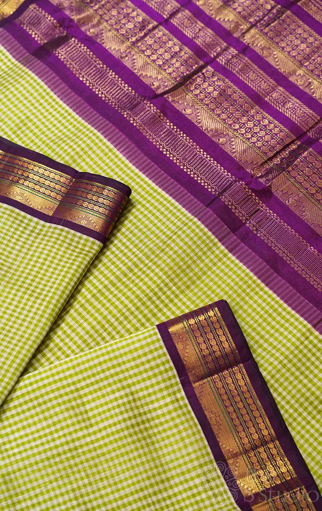 Light green checked handloom kanchipuram silk cotton saree with korvai zari border