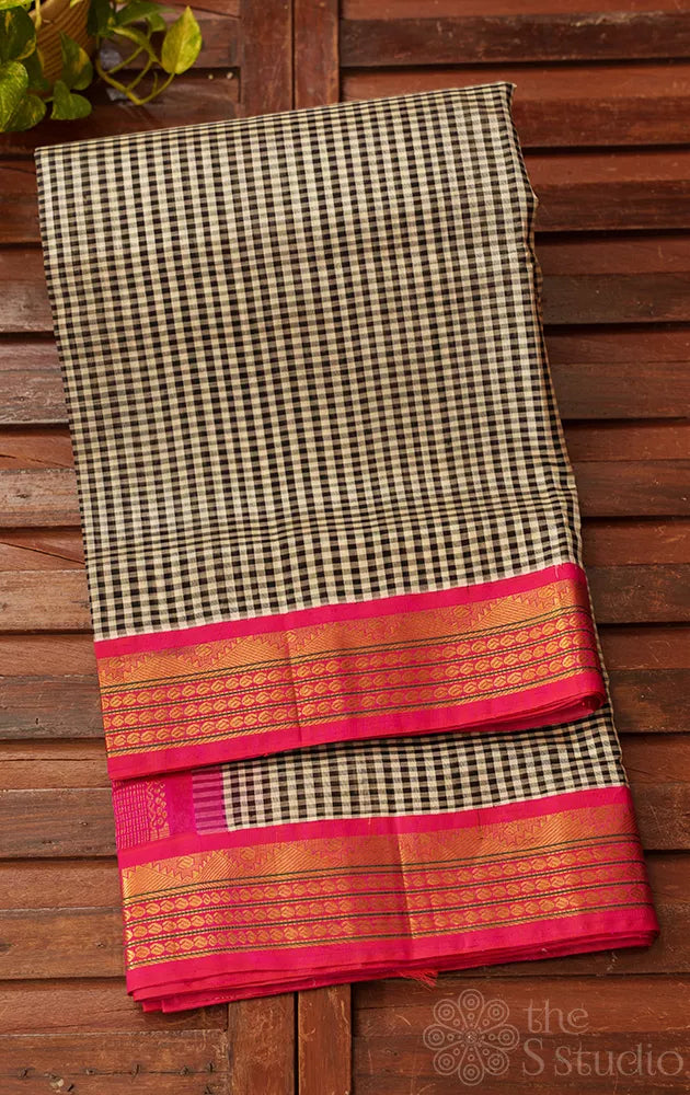 Black and white checked cotton silk saree with rani pink korvai border