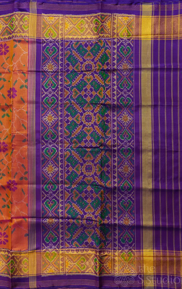 Peach patola pattu saree with woven floral motifs and tissue border
