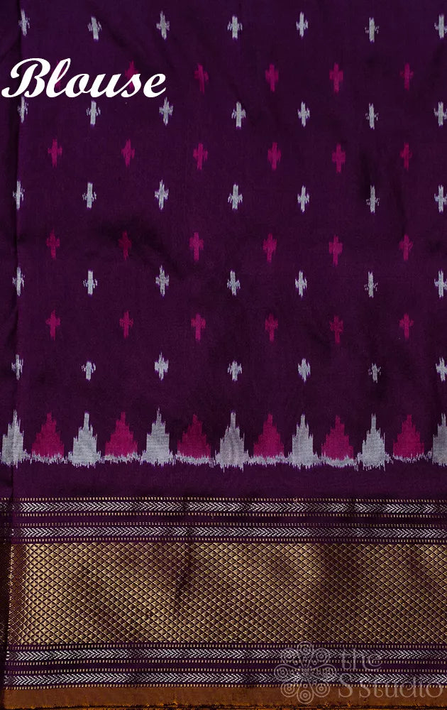 Pale green ikkat silk saree with contrast purple zari border