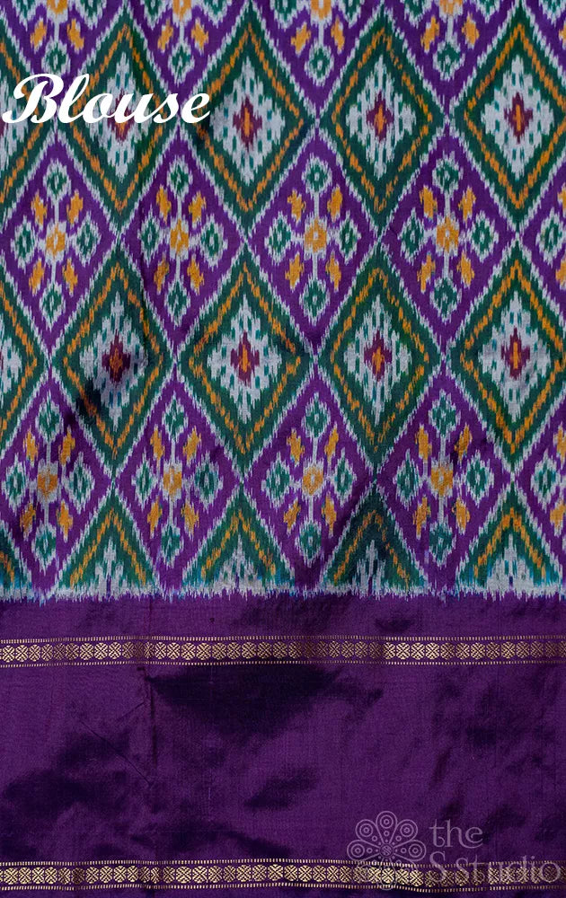 Off white ikkat silk saree with geometric violet border