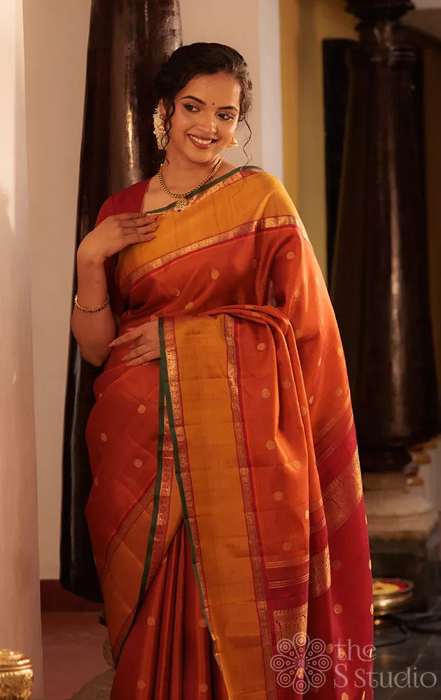 Rust kanchipuram silk saree with rettaipet border