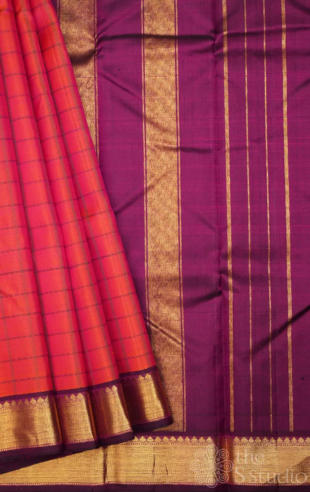 Peachish orange checked kanjivaram silk saree with purple zari border