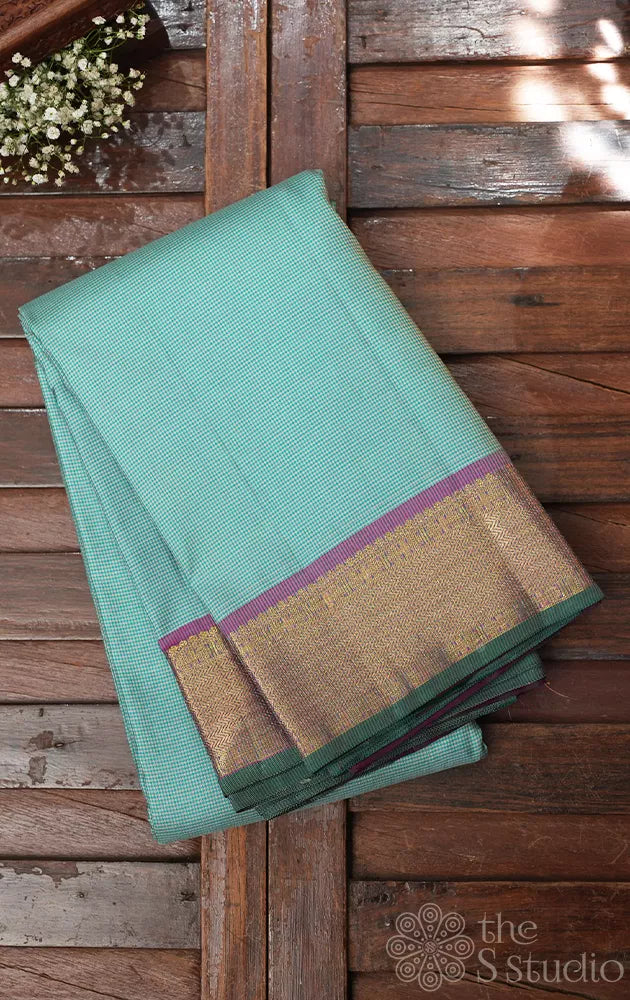 Aqua green checked kanchi pattu saree with getti zari border