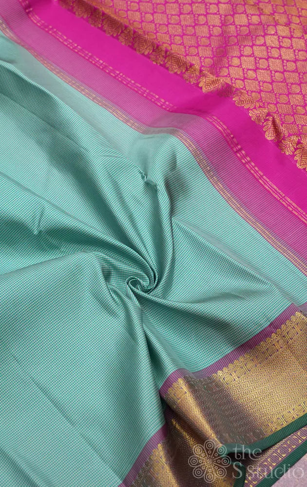Aqua green checked kanchi pattu saree with getti zari border
