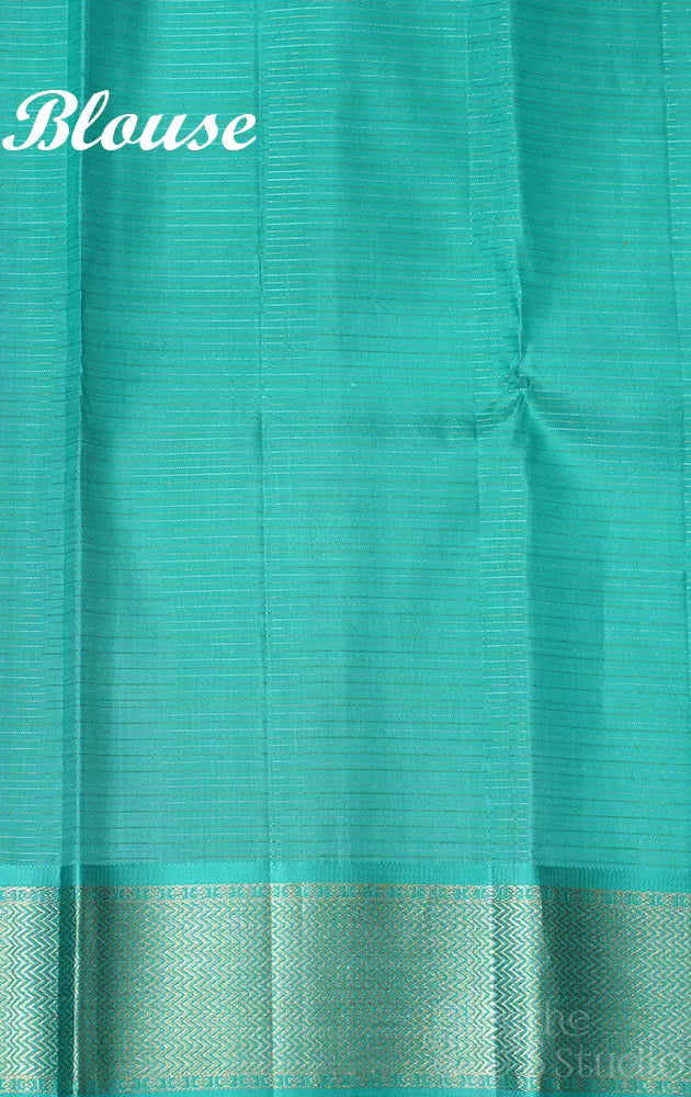 Yellow kanchi pattu saree with sea green zari woven long border