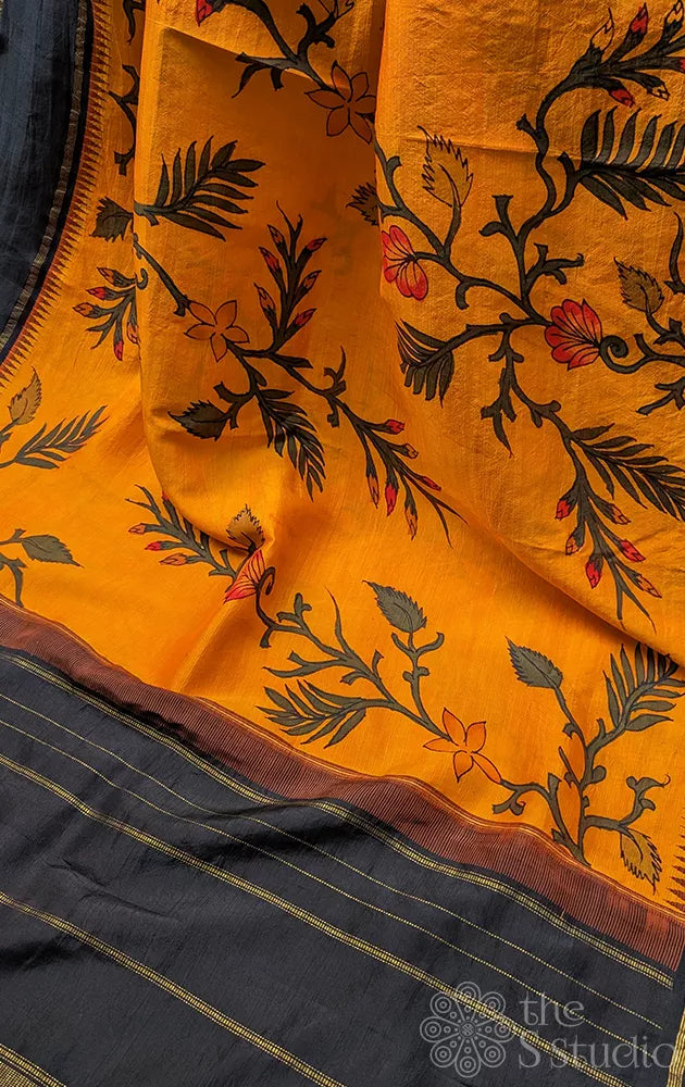 Pen kalamkari kanchi silk saree in mango orange with black border